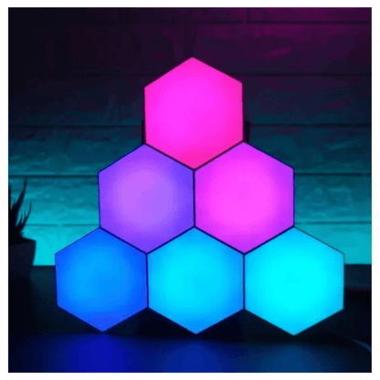 Luces Hexagonales 17 Colores LED en vibrantes tonos rosa y azul, perfectas para crear ambientes únicos.